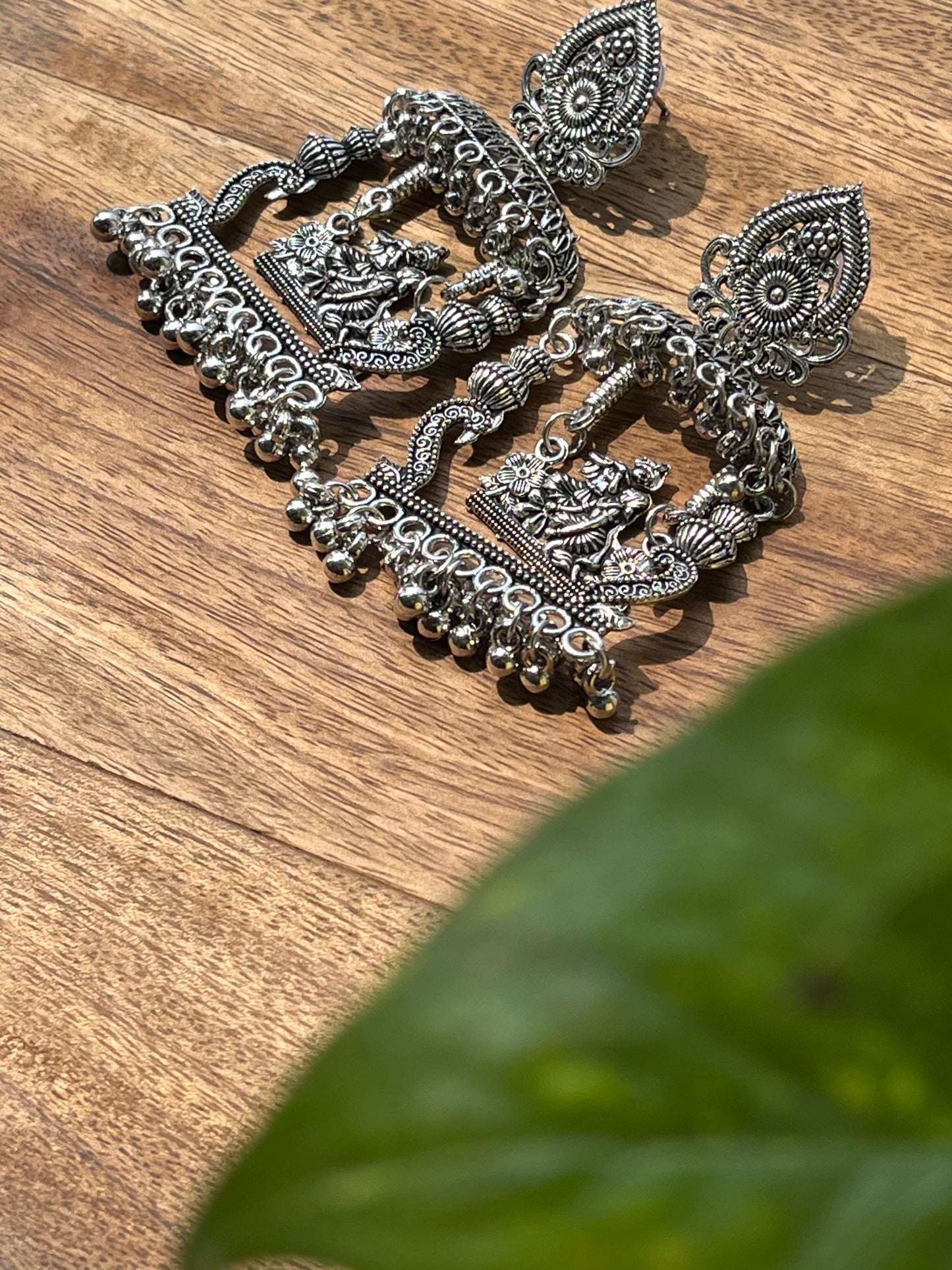 Oxidised Temple Motif Jhumka Earrings
